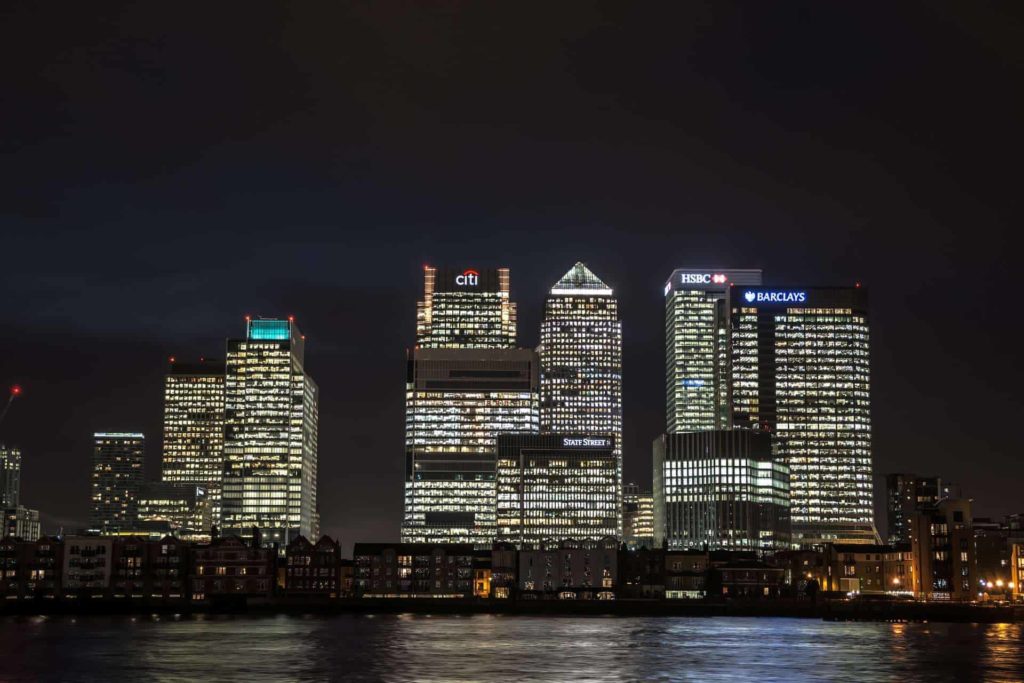 skyscrapers of canary wharf in london at night