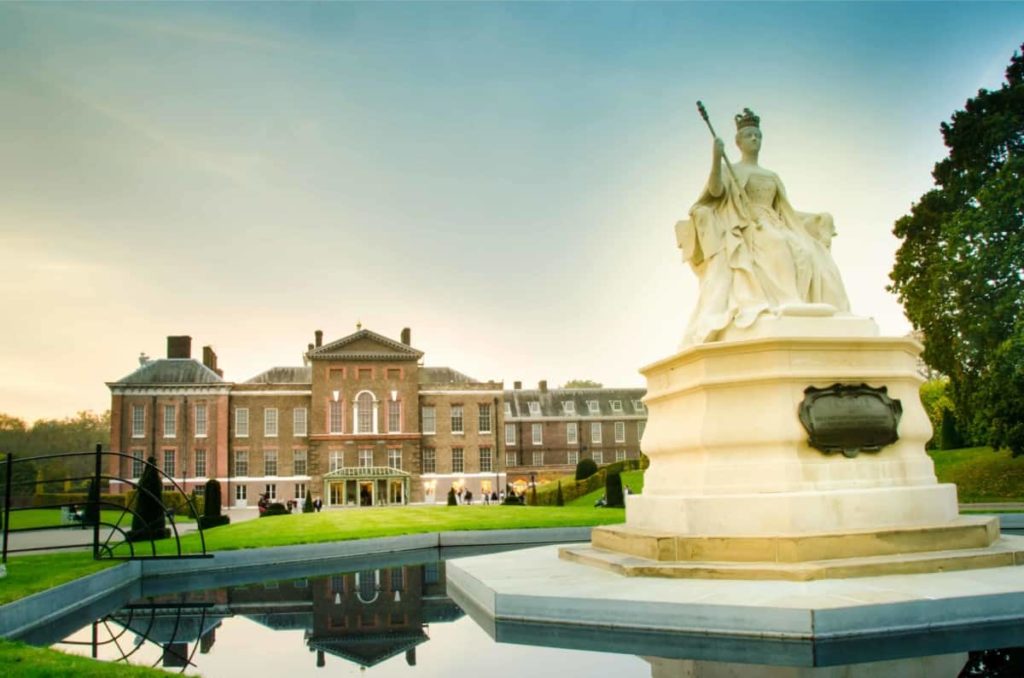 View of Kensington Palace with memorial in fountain