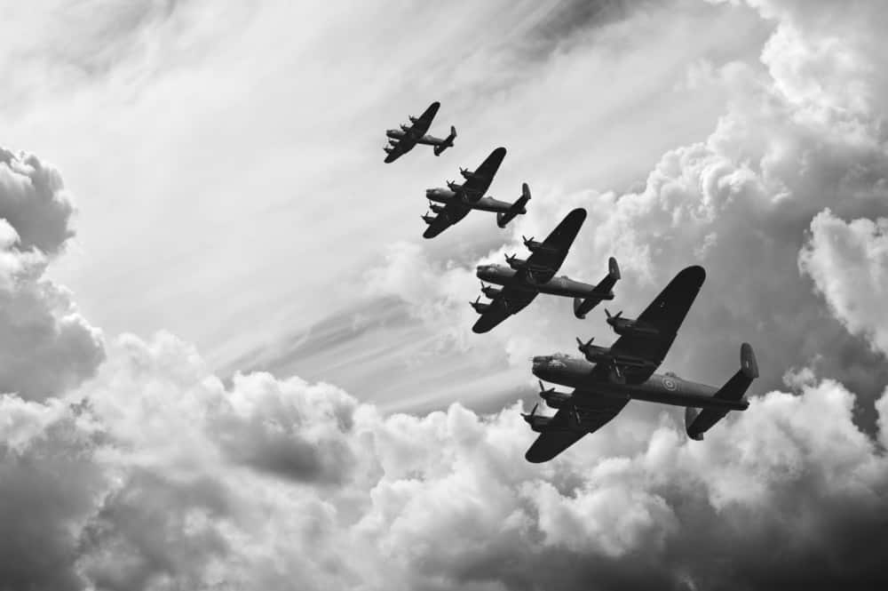 lancaster bombers flying through the sky in formation during the battle of britain